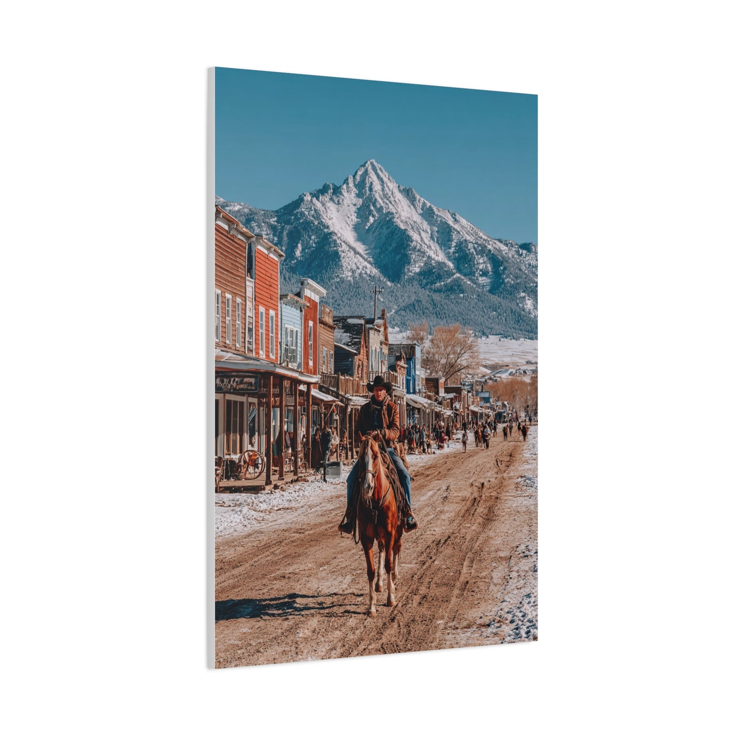 Cowboy Riding Through a Frontier Mountain Town Wall Art & Canvas Print